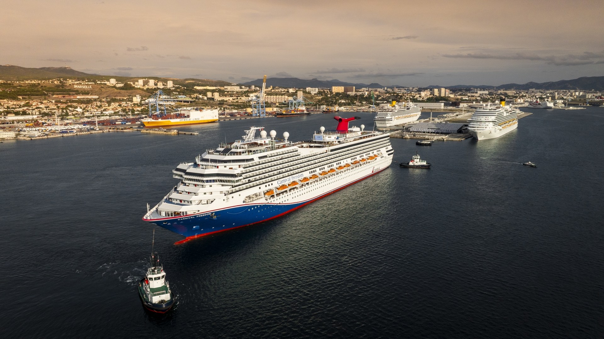 Carnival Freedom departs the shipyard in Marseille Carnival Freedom with her new funnel leaving the shipyard in Marseille, France